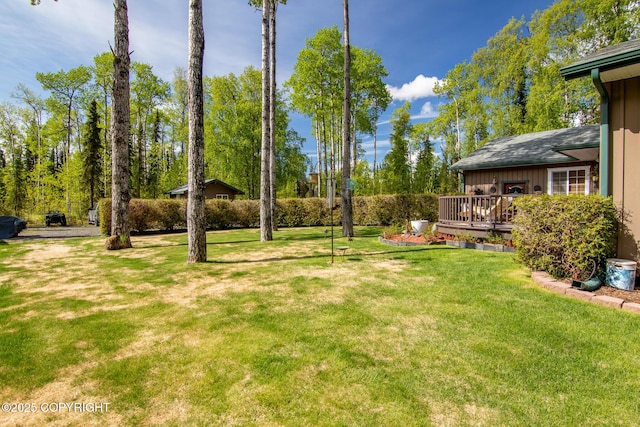 38686 Hart Ct, Soldotna, AK 99669 - view of green lawn featuring a deck
