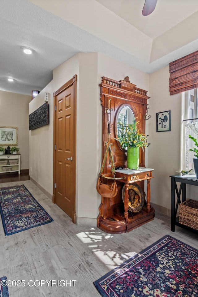 38686 Hart Ct, Soldotna, AK 99669 - entryway featuring wood finished floors and a ceiling fan