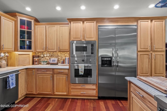 38686 Hart Ct, Soldotna, AK 99669 - kitchen with built in appliances, light countertops, glass insert cabinets, decorative backsplash, and recessed lighting