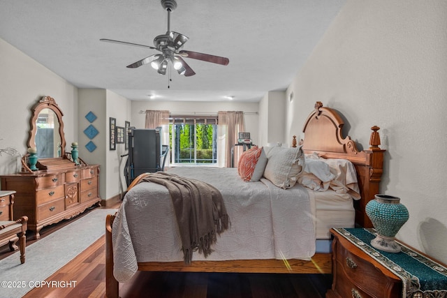 38686 Hart Ct, Soldotna, AK 99669 - bedroom with wood finished floors and a ceiling fan