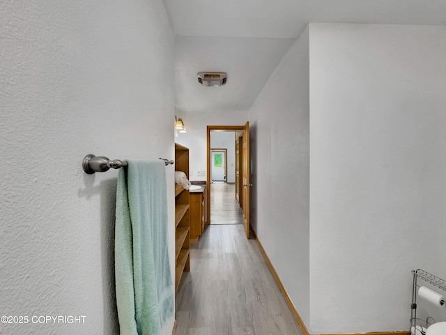 26839 S Talkeetna Spur Rd, Talkeetna, AK 99676 - corridor featuring light wood-type flooring and baseboards