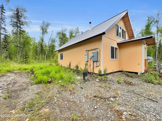 26839 S Talkeetna Spur Rd, Talkeetna, AK 99676 - view of side of home featuring metal roof