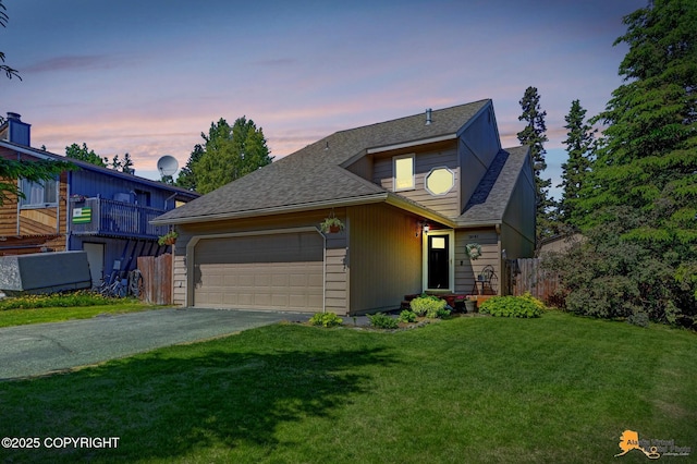 3941 Eric Cir, Anchorage, AK 99507 - view of front of house featuring a garage, driveway, and a shingled roof