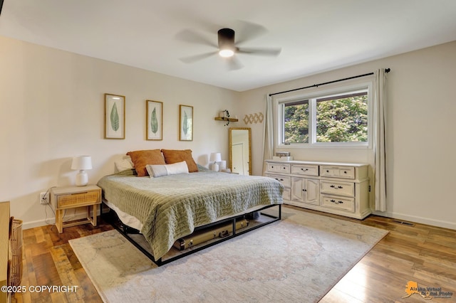 3941 Eric Cir, Anchorage, AK 99507 - bedroom featuring light wood-style flooring and ceiling fan