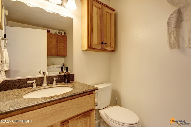 3941 Eric Cir, Anchorage, AK 99507 - bathroom with vanity and toilet