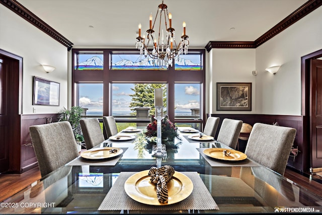 9900 Hillhaven Cir, Anchorage, AK 99507 - dining space with a chandelier, ornamental molding, a wainscoted wall, and wood finished floors