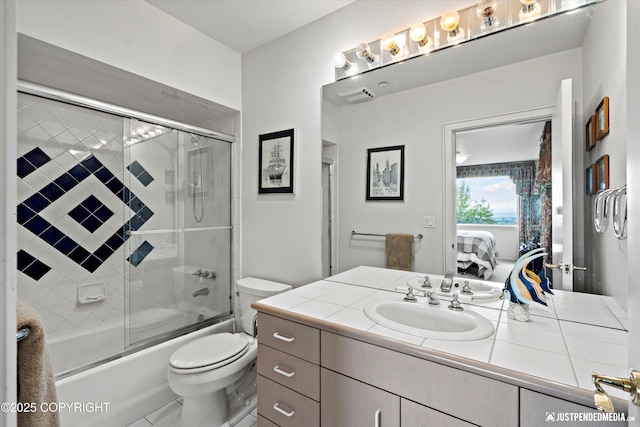 9900 Hillhaven Cir, Anchorage, AK 99507 - bathroom with ensuite bath, vanity, and combined bath / shower with glass door