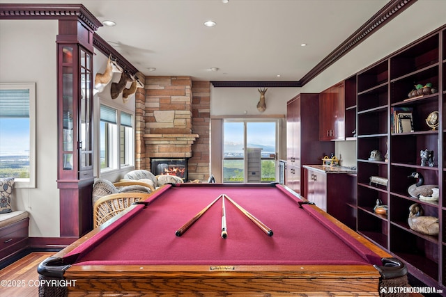 9900 Hillhaven Cir, Anchorage, AK 99507 - game room featuring billiards, crown molding, wood finished floors, a fireplace, and recessed lighting