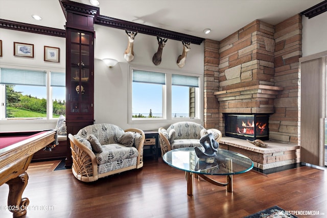 9900 Hillhaven Cir, Anchorage, AK 99507 - living room with a fireplace, healthy amount of natural light, wood finished floors, and pool table