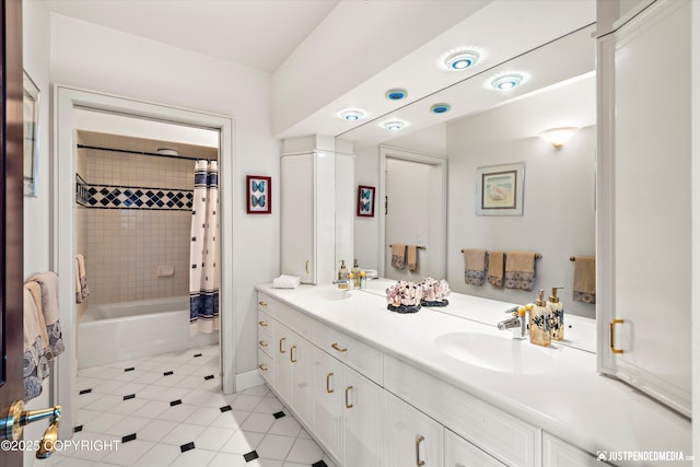 9900 Hillhaven Cir, Anchorage, AK 99507 - full bathroom with double vanity, tile patterned flooring, and shower / bath combo with shower curtain