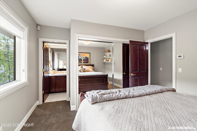 9900 Hillhaven Cir, Anchorage, AK 99507 - carpeted bedroom featuring a closet and ensuite bathroom