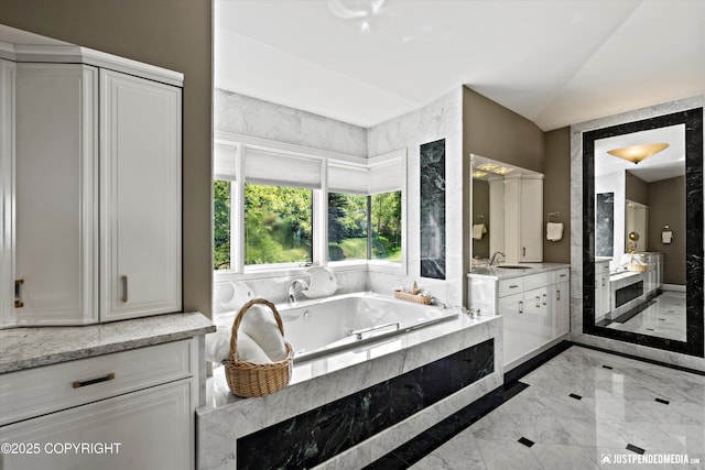 9900 Hillhaven Cir, Anchorage, AK 99507 - full bath featuring marble tiled floors, vanity, and a whirlpool tub