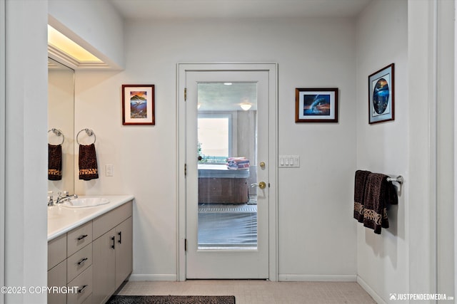 9900 Hillhaven Cir, Anchorage, AK 99507 - bathroom featuring vanity and baseboards
