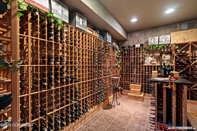 9900 Hillhaven Cir, Anchorage, AK 99507 - wine room featuring recessed lighting