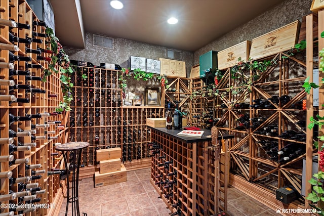 9900 Hillhaven Cir, Anchorage, AK 99507 - wine room featuring recessed lighting