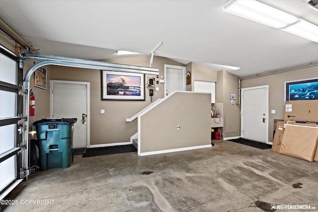 9900 Hillhaven Cir, Anchorage, AK 99507 - garage featuring baseboards