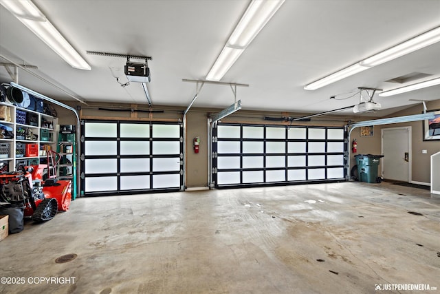 9900 Hillhaven Cir, Anchorage, AK 99507 - garage with a garage door opener