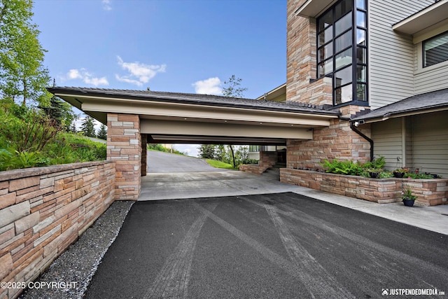 9900 Hillhaven Cir, Anchorage, AK 99507 - view of parking featuring driveway