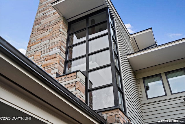 9900 Hillhaven Cir, Anchorage, AK 99507 - detailed view of stone siding