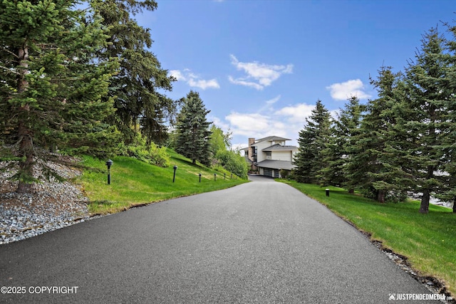 9900 Hillhaven Cir, Anchorage, AK 99507 - view of front facade featuring a front yard