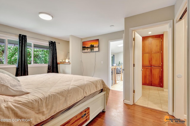 3868 Shannon Cir, Anchorage, AK 99508 - bedroom featuring light wood-type flooring