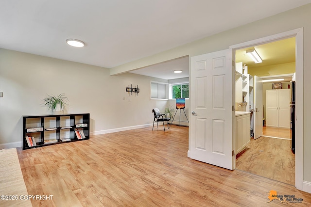 3868 Shannon Cir, Anchorage, AK 99508 - living area with light wood-type flooring and baseboards