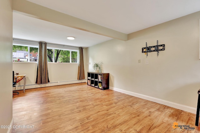 3868 Shannon Cir, Anchorage, AK 99508 - interior space featuring wood finished floors, a baseboard heating unit, and baseboards