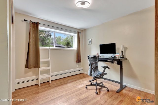 3868 Shannon Cir, Anchorage, AK 99508 - home office with wood finished floors and a baseboard heating unit