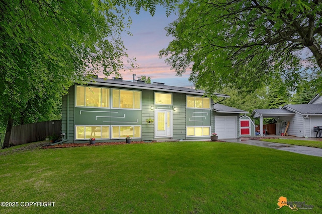 3868 Shannon Cir, Anchorage, AK 99508 - bi-level home with concrete driveway and a garage