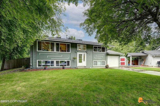 3868 Shannon Cir, Anchorage, AK 99508 - bi-level home with an attached garage and driveway