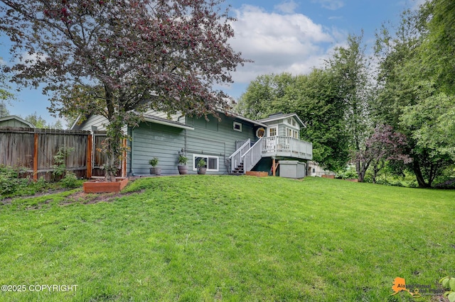 3868 Shannon Cir, Anchorage, AK 99508 - back of house with stairway and a deck