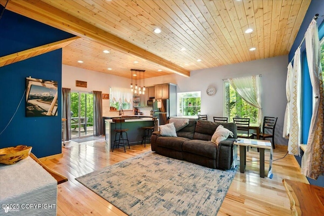 23069 Christiansen Lake Rd, Talkeetna, AK 99676 - living area with recessed lighting, a wooden ceiling with exposed beams, light wood-style flooring, and a chandelier