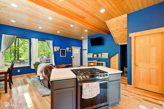 23069 Christiansen Lake Rd, Talkeetna, AK 99676 - kitchen featuring stainless steel gas range oven, wooden ceiling, recessed lighting, gray cabinetry, and light countertops
