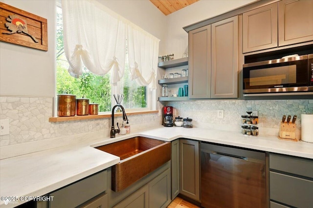 23069 Christiansen Lake Rd, Talkeetna, AK 99676 - kitchen with stainless steel appliances, gray cabinets, backsplash, and open shelves