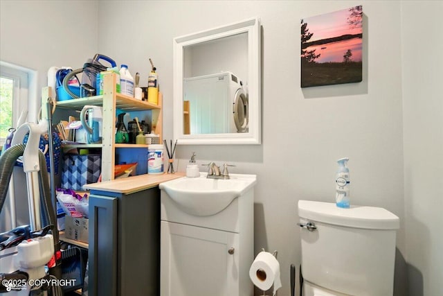 23069 Christiansen Lake Rd, Talkeetna, AK 99676 - bathroom featuring vanity and stacked washer and clothes dryer