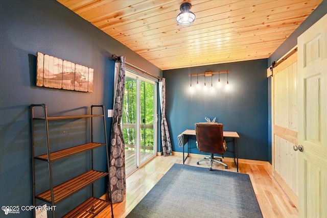 23069 Christiansen Lake Rd, Talkeetna, AK 99676 - office with wood ceiling, wood finished floors, and a barn door