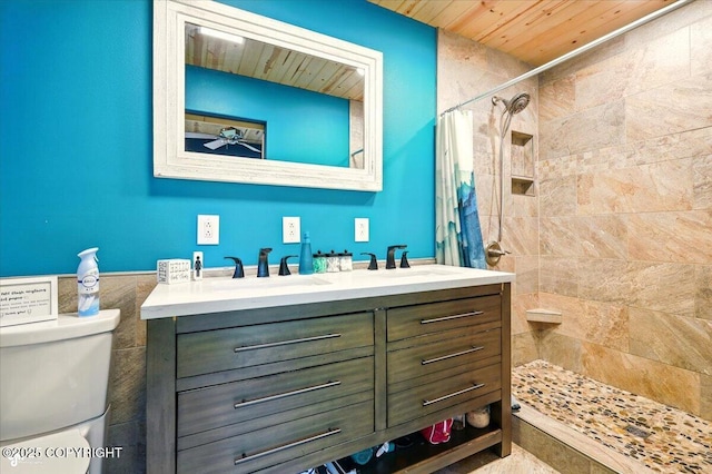 23069 Christiansen Lake Rd, Talkeetna, AK 99676 - full bath with wooden ceiling, double vanity, tiled shower, and a ceiling fan