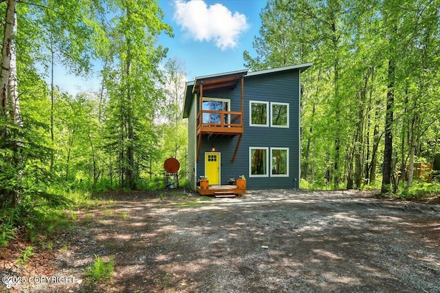23069 Christiansen Lake Rd, Talkeetna, AK 99676 - rear view of house with a balcony