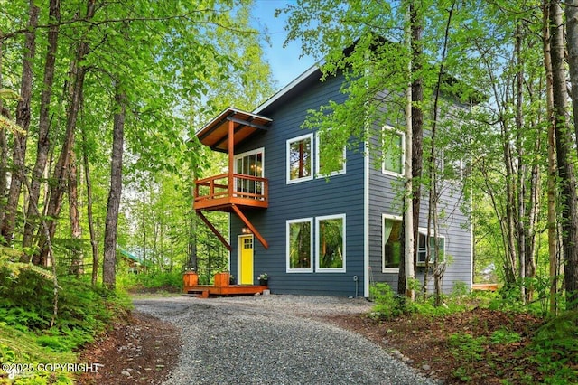 23069 Christiansen Lake Rd, Talkeetna, AK 99676 - rear view of property with a balcony