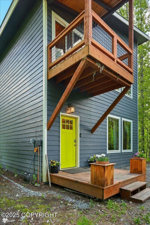 23069 Christiansen Lake Rd, Talkeetna, AK 99676 - back of property with a balcony and a wooden deck