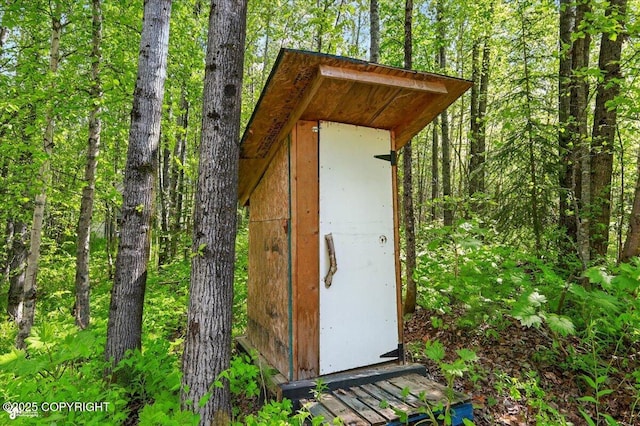 23069 Christiansen Lake Rd, Talkeetna, AK 99676 - view of shed with a forest view