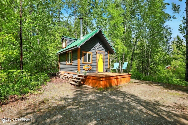 23069 Christiansen Lake Rd, Talkeetna, AK 99676 - view of home's exterior featuring a deck