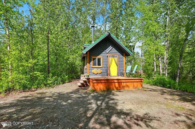 23069 Christiansen Lake Rd, Talkeetna, AK 99676 - chalet / cabin featuring a wooden deck