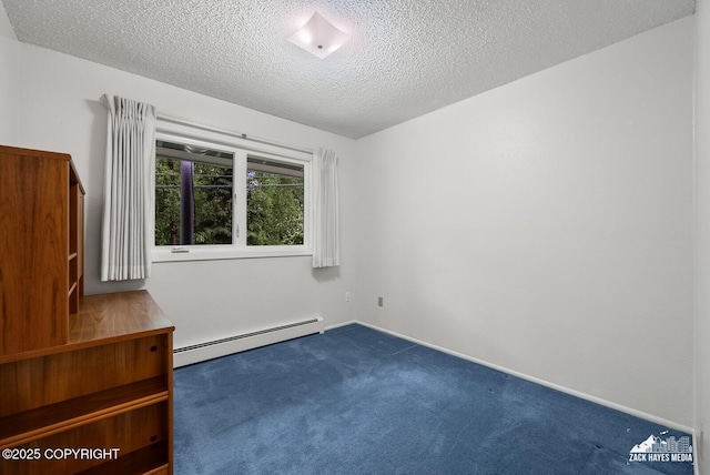3750 Winterset Dr, Anchorage, AK 99508 - spare room with a baseboard heating unit, dark colored carpet, and a textured ceiling