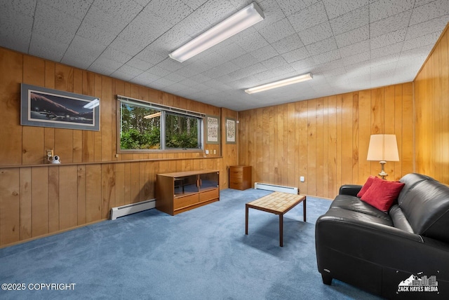 3750 Winterset Dr, Anchorage, AK 99508 - carpeted living room featuring baseboard heating and wooden walls