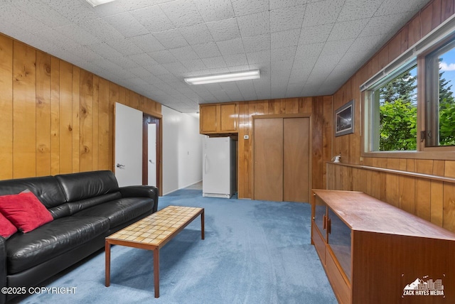 3750 Winterset Dr, Anchorage, AK 99508 - living area with wood walls and light carpet