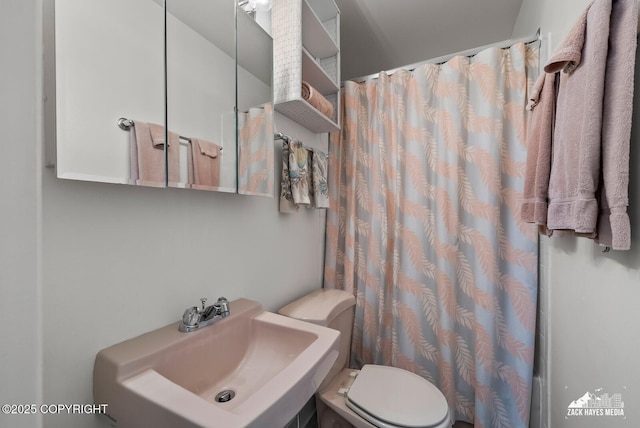 3750 Winterset Dr, Anchorage, AK 99508 - full bathroom with a sink and a shower with shower curtain