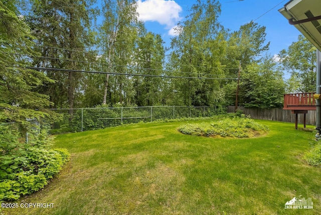 3750 Winterset Dr, Anchorage, AK 99508 - view of yard featuring a wooden deck