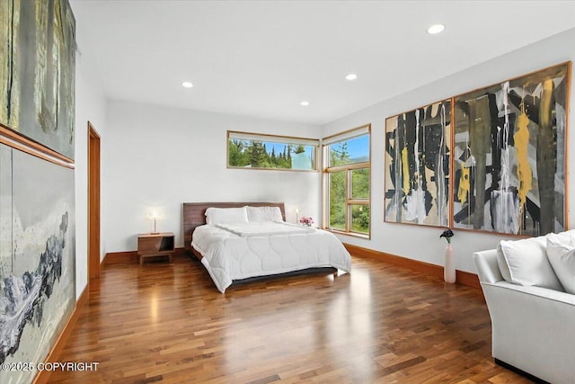 10500 Blackwolf Cir, Anchorage, AK 99507 - bedroom with wood finished floors and recessed lighting