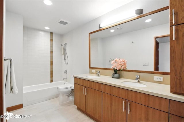 10500 Blackwolf Cir, Anchorage, AK 99507 - bathroom with double vanity, washtub / shower combination, and recessed lighting